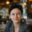 Камілла К.